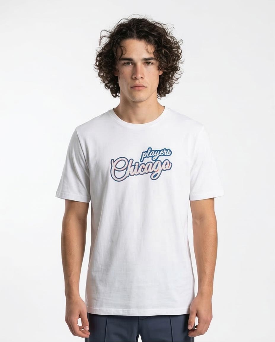 Person wearing a white t-shirt with 'Chicago' text on a plain background