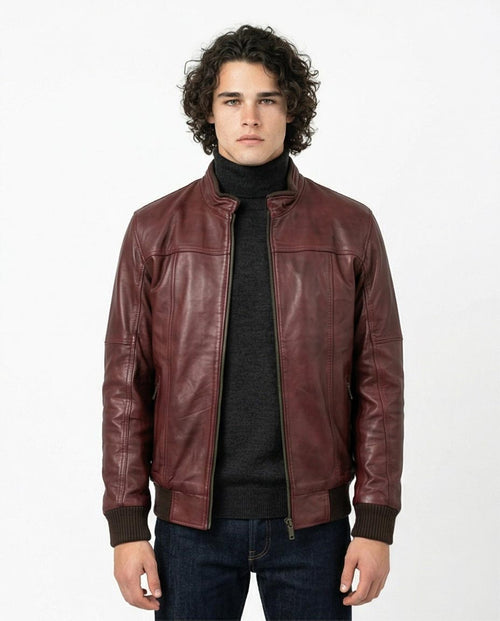 Man wearing a brown leather jacket on a white background