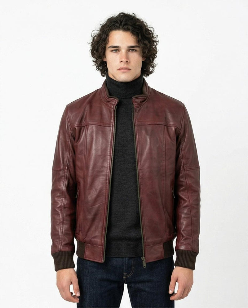 Man wearing a brown leather jacket on a white background