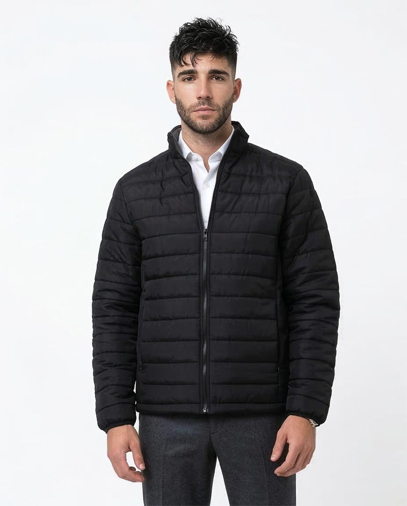 Man wearing a black puffer jacket on a white background