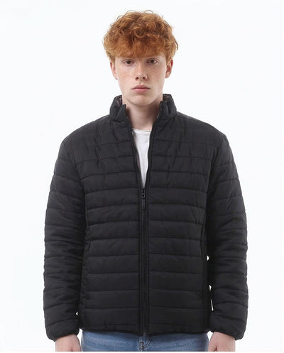 Person wearing a black puffer jacket on a white background