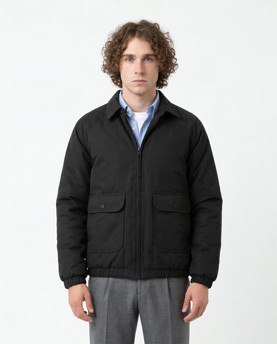 Man wearing a black jacket on a white background
