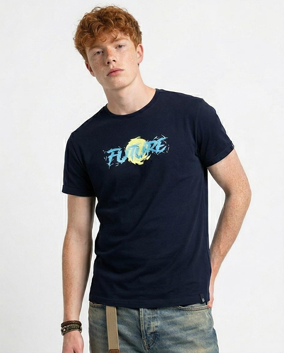 Person wearing a navy blue t-shirt with a colorful graphic design on a plain background