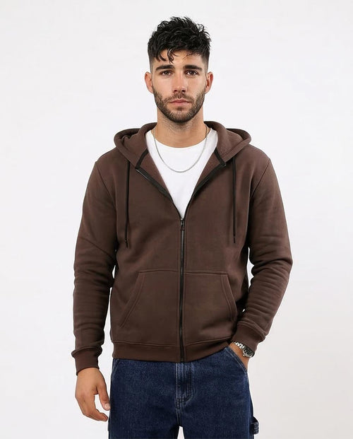Man wearing a brown hoodie on a white background