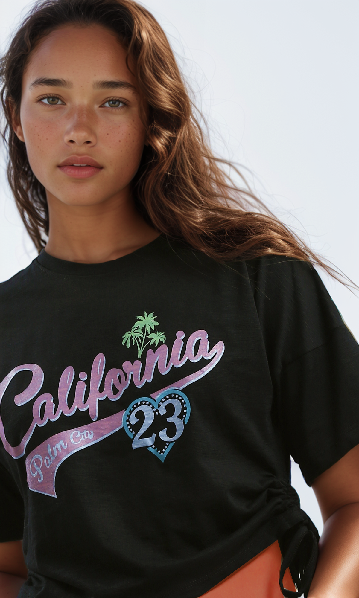 O182050 "California" Relaxed Fit Black Cropped Tee