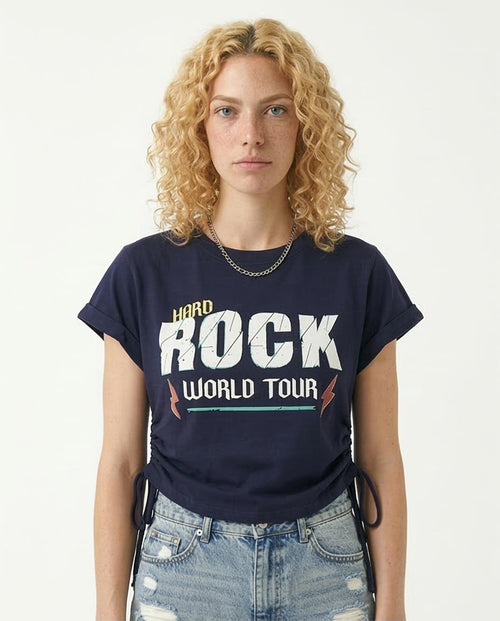 Person wearing a navy blue t-shirt with 'Hard Rock World Tour' text on a white background