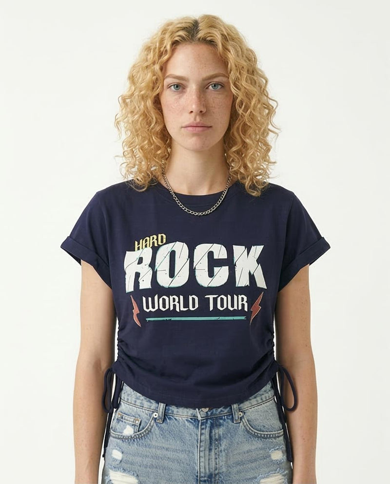 Person wearing a navy blue t-shirt with 'Hard Rock World Tour' text on a white background