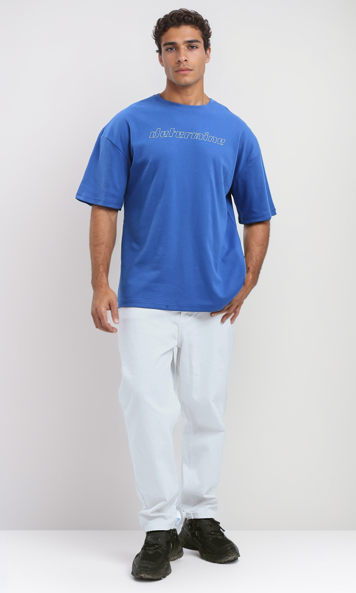 O191642 Blue Cotton Tee With "Determine" Print