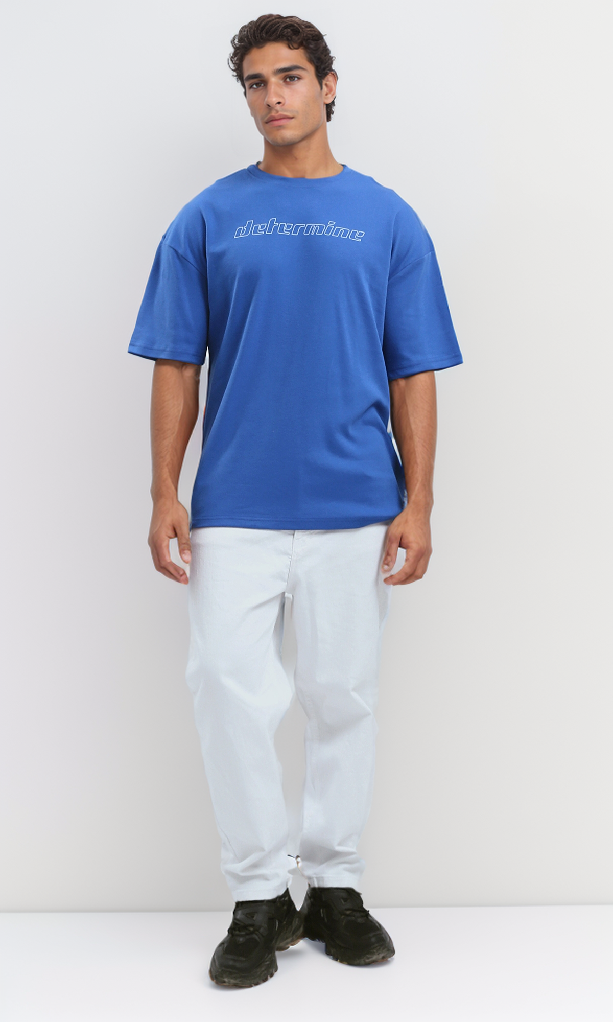 O191642 Blue Cotton Tee With "Determine" Print