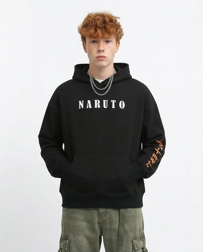 Person wearing a black hoodie with 'NARUTO' text on a white background