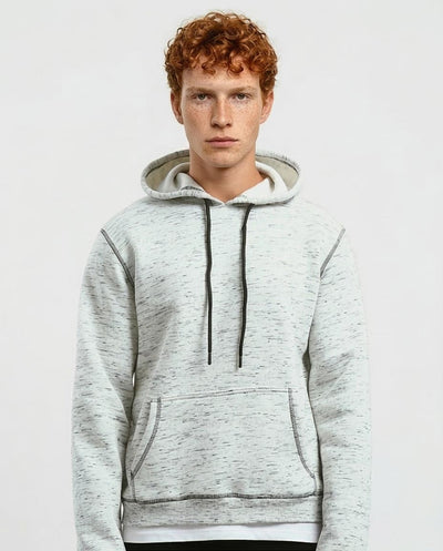 Man wearing a gray hoodie against a white background
