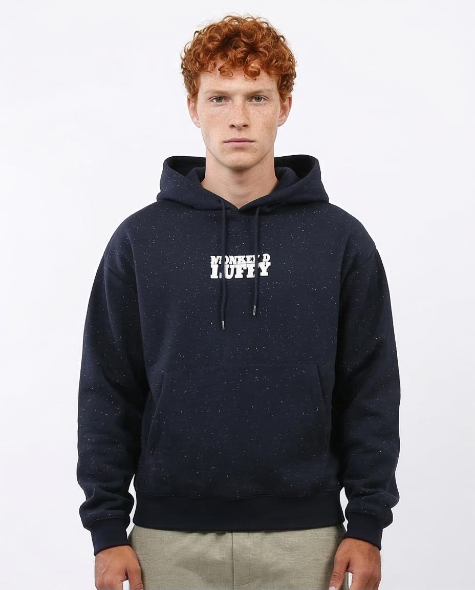 Person wearing a navy hoodie with text on a white background