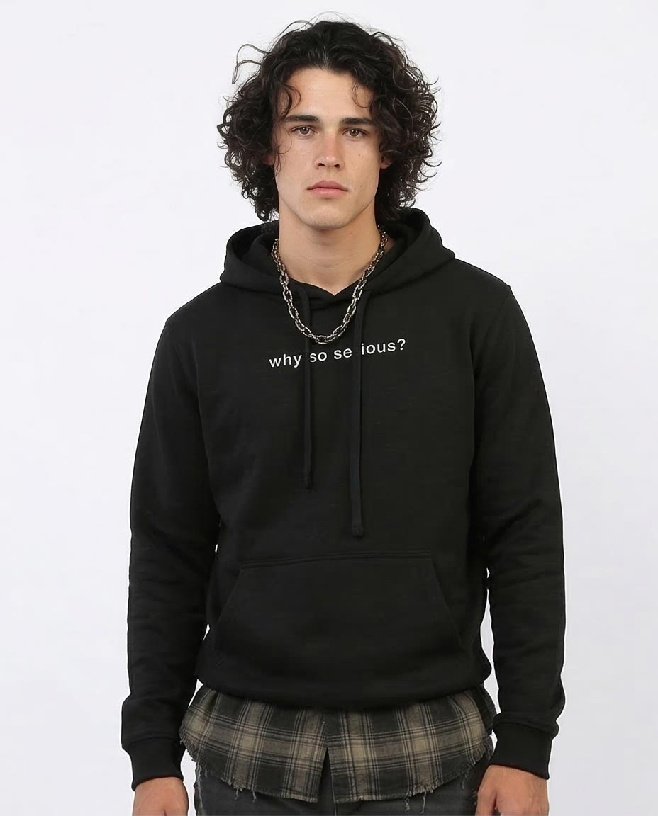 Person wearing a black hoodie with 'why so serious?' text on a white background