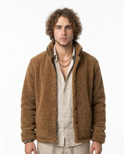 Man wearing a brown fleece jacket on a white background