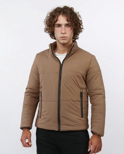 Man wearing a brown puffer jacket on a white background