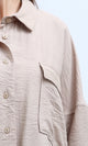 قميص بأكمام 3/4 بيج مع جيوب جانبية