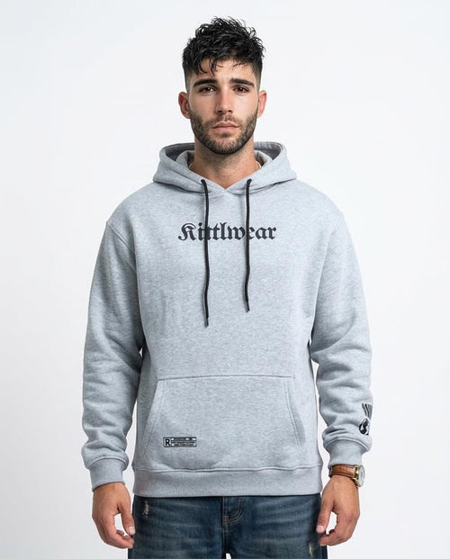 Man wearing a gray hoodie with 'Kithwear' branding on a white background