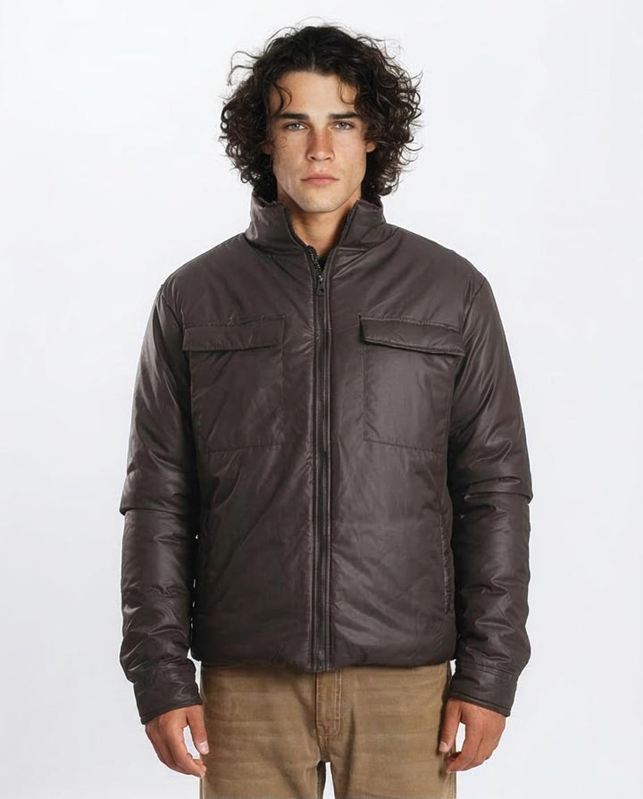 Man wearing a brown jacket on a white background