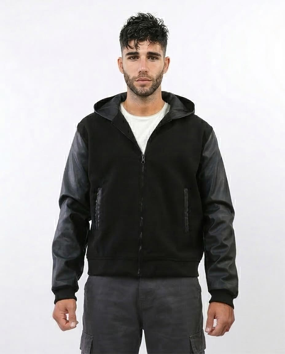 Man wearing a black jacket with a hood on a white background