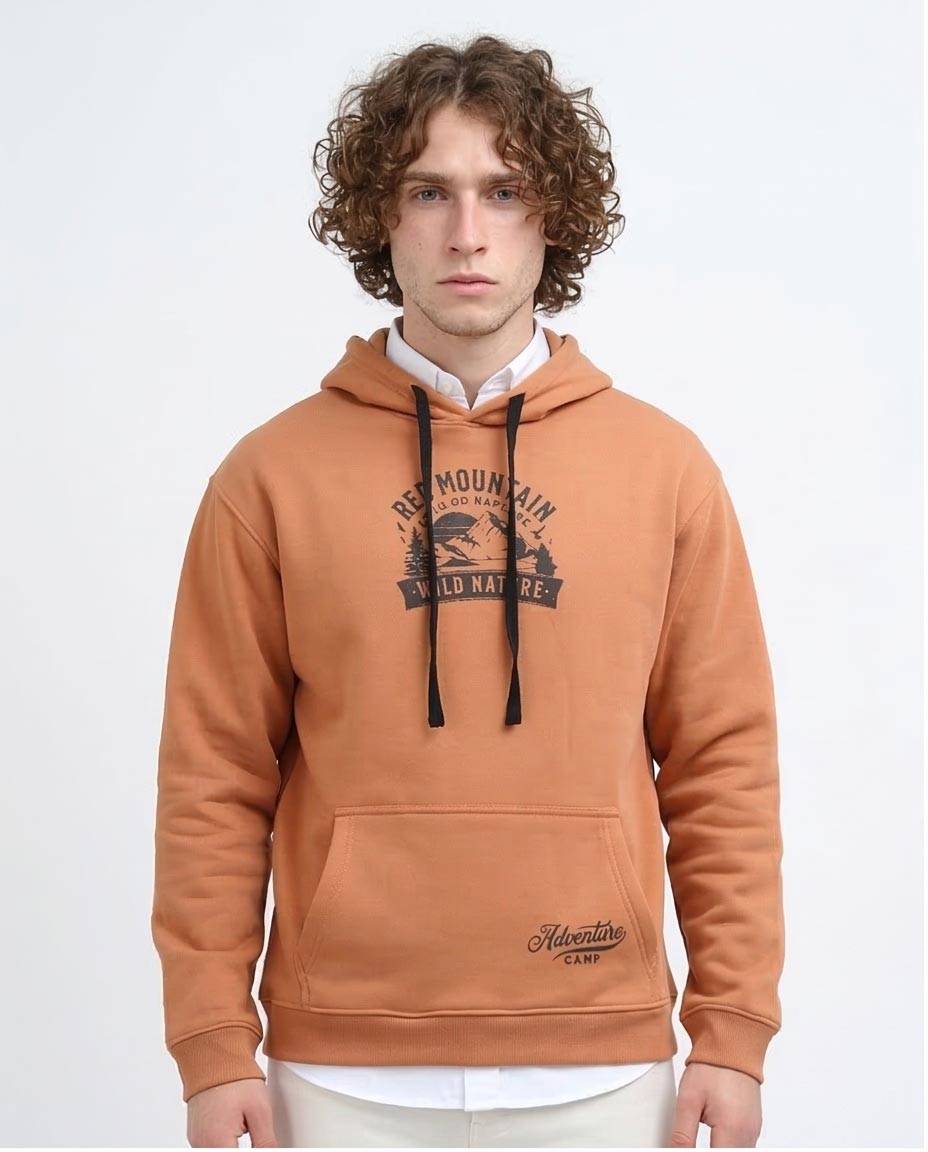Man wearing a brown hoodie with a logo on a white background