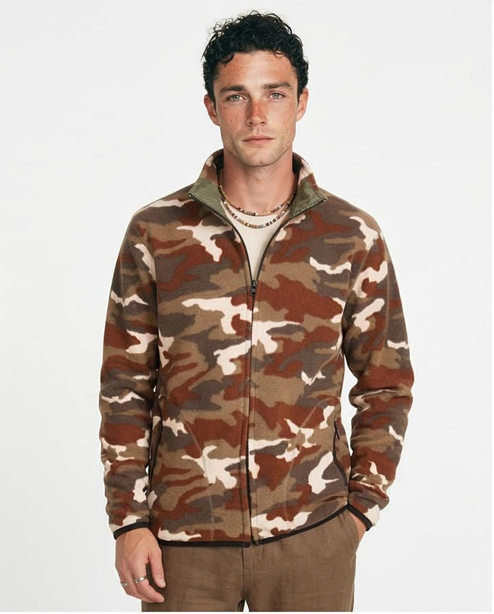 Man wearing a camouflage jacket on a white background