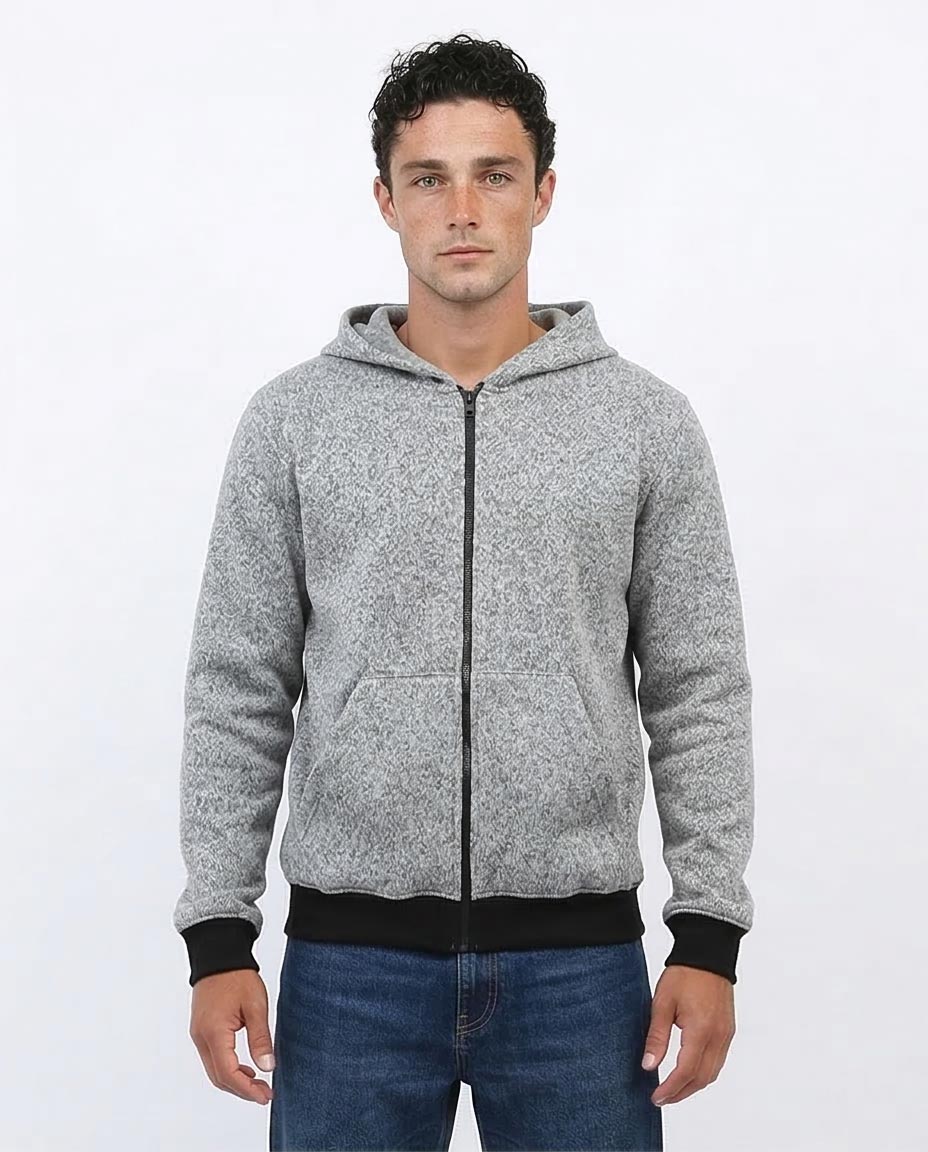 Man wearing a gray zip-up hoodie on a white background