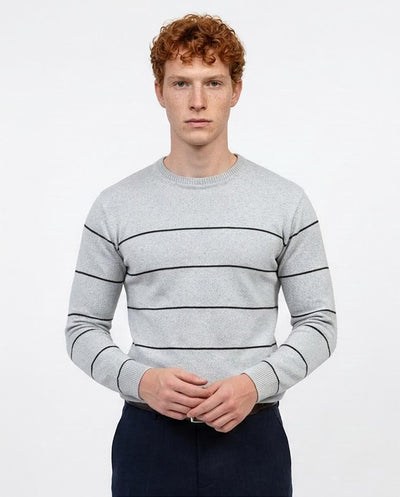 Man wearing a gray striped sweater on a white background