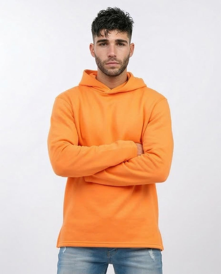 Man wearing an orange hoodie against a white background