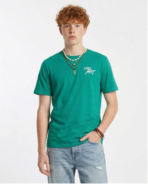 Person wearing a green t-shirt with a logo on a white background