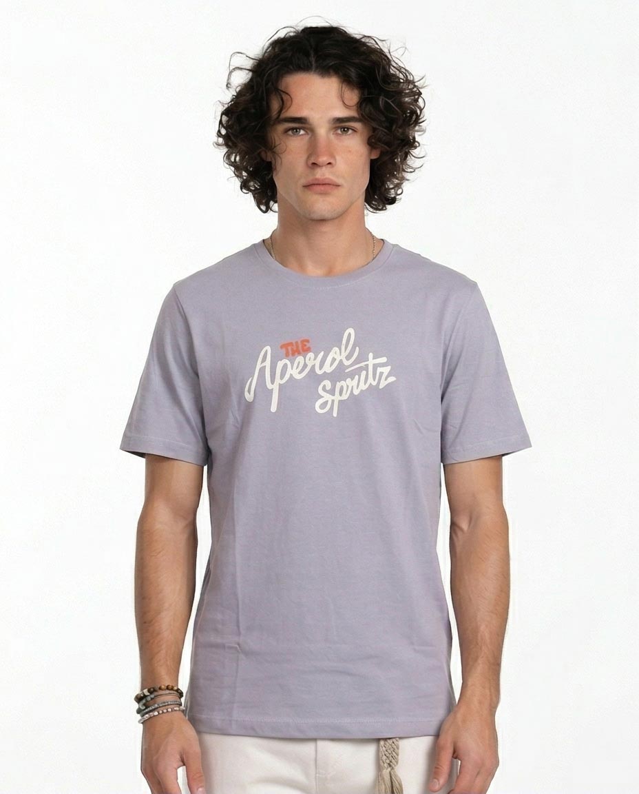 Man wearing a gray t-shirt with text on a white background