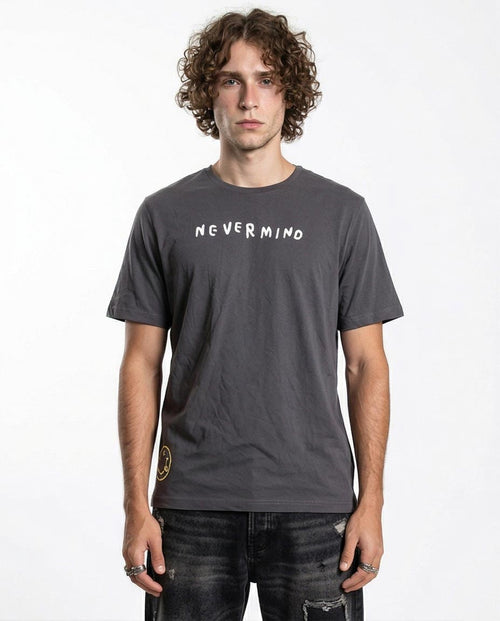 Man wearing a gray t-shirt with 'NEVERMIND' text on a white background