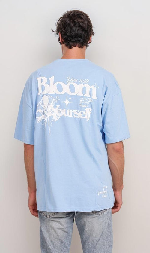O203121 - Floral "Bloom Yourself" Oversized T-Shirt – Light Blue