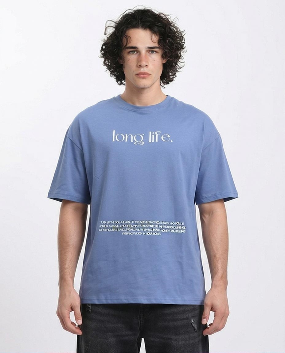 Person wearing a blue t-shirt with 'long life.' text on a white background