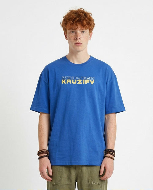Person wearing a blue t-shirt with 'KRUZIFY' text on a white background