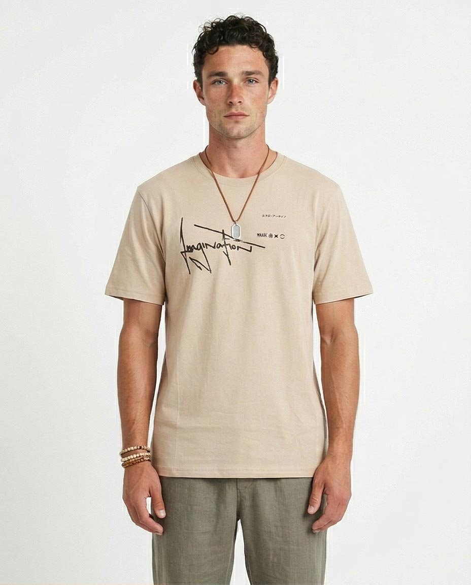 Man wearing a beige t-shirt with a logo on a white background
