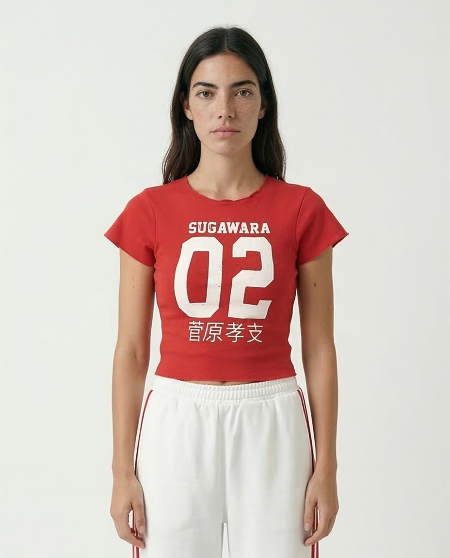Person wearing a red t-shirt with 'Sugawara 02' printed on it against a white background