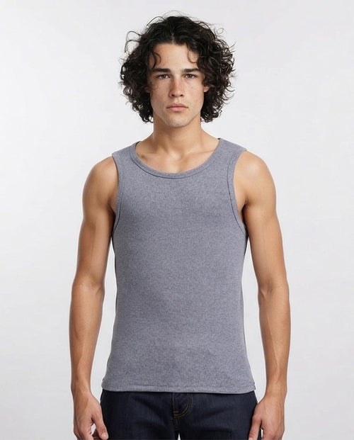 Man wearing a gray tank top against a white background