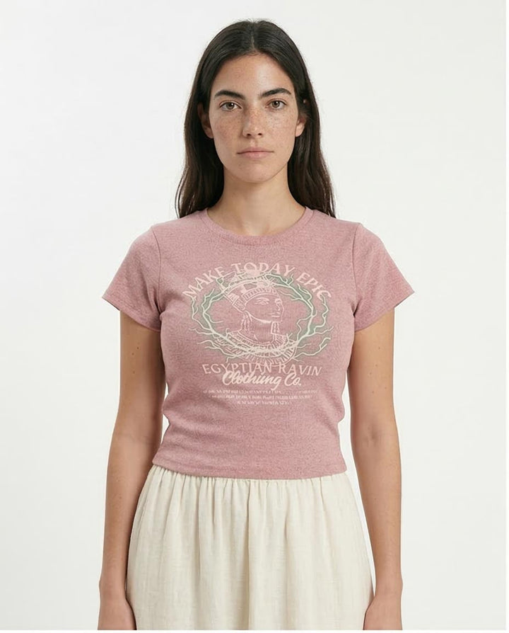 Woman wearing a pink t-shirt with a graphic design on a white background