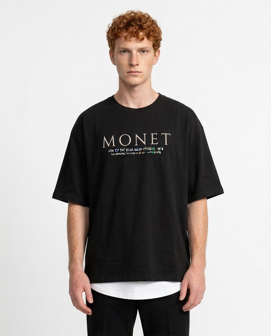 Man wearing a black t-shirt with 'MONET' branding on a white background