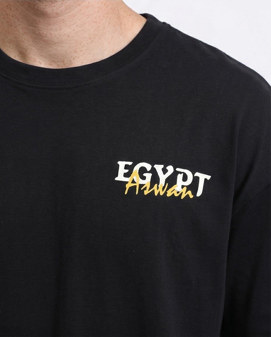 تيشرت رافين أوفر سايز بطبعة أسوان الجرافيكية - أسود - R207683