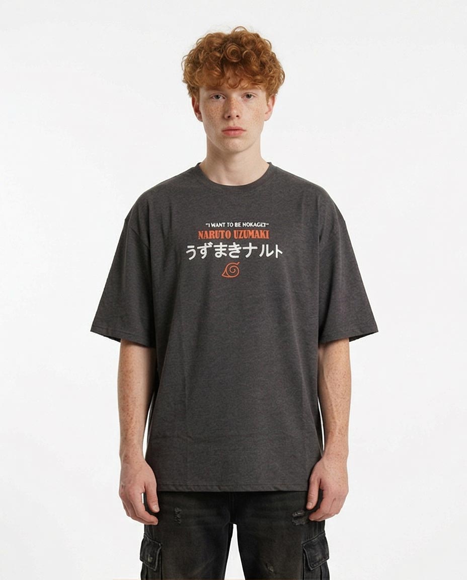 Person wearing a dark gray t-shirt with text and graphics on a white background
