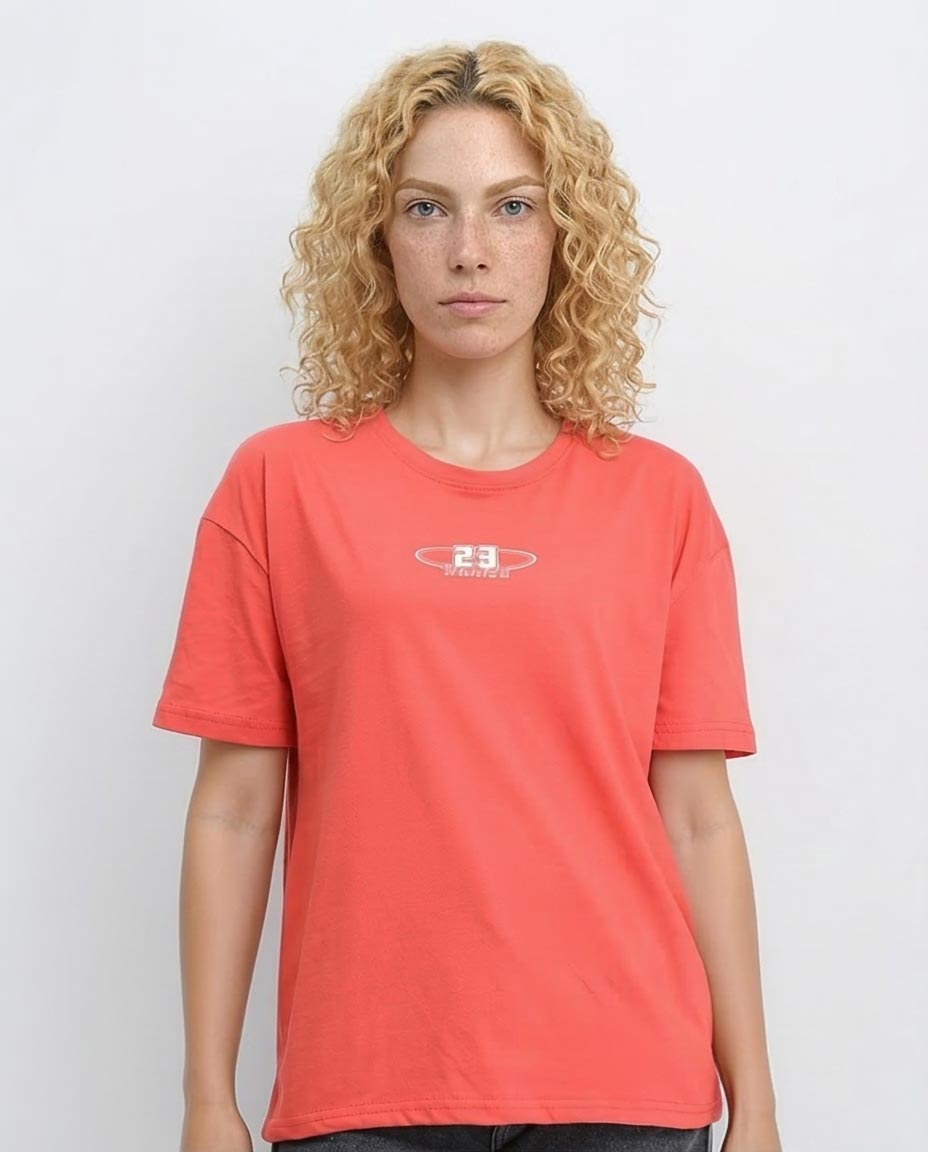 Woman wearing a red t-shirt with a logo on a white background