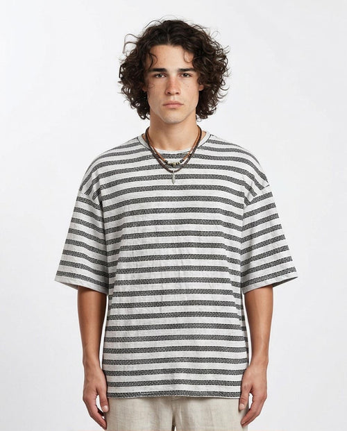 Man wearing a striped shirt on a white background