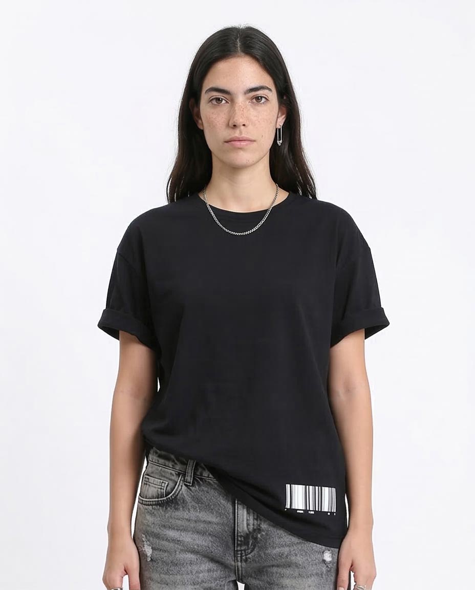Woman wearing a black t-shirt with a barcode design on a white background