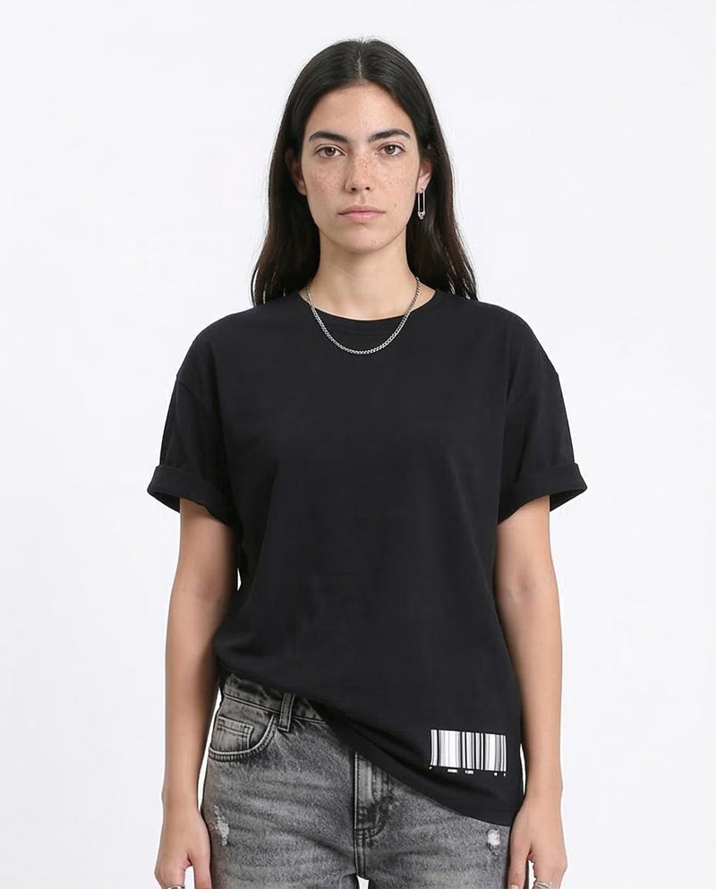 Woman wearing a black t-shirt with a barcode design on a white background
