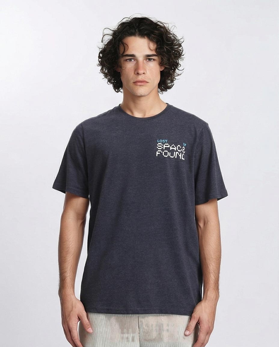 Man wearing a dark gray t-shirt with text on a white background