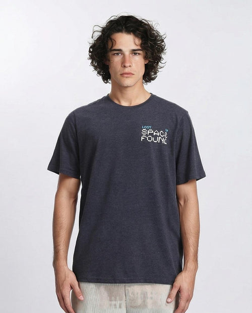 Man wearing a dark gray t-shirt with text on a white background