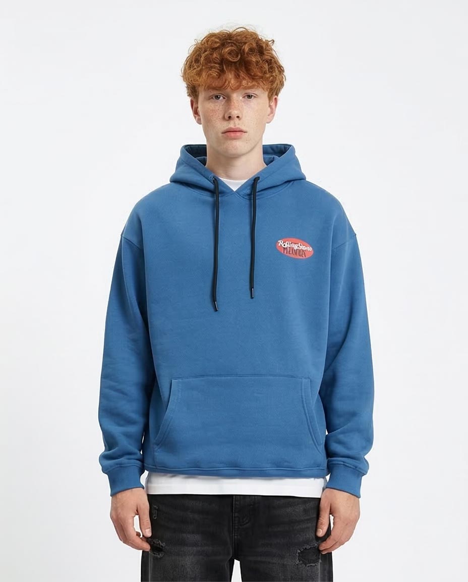 Person wearing a blue hoodie with a logo on a white background