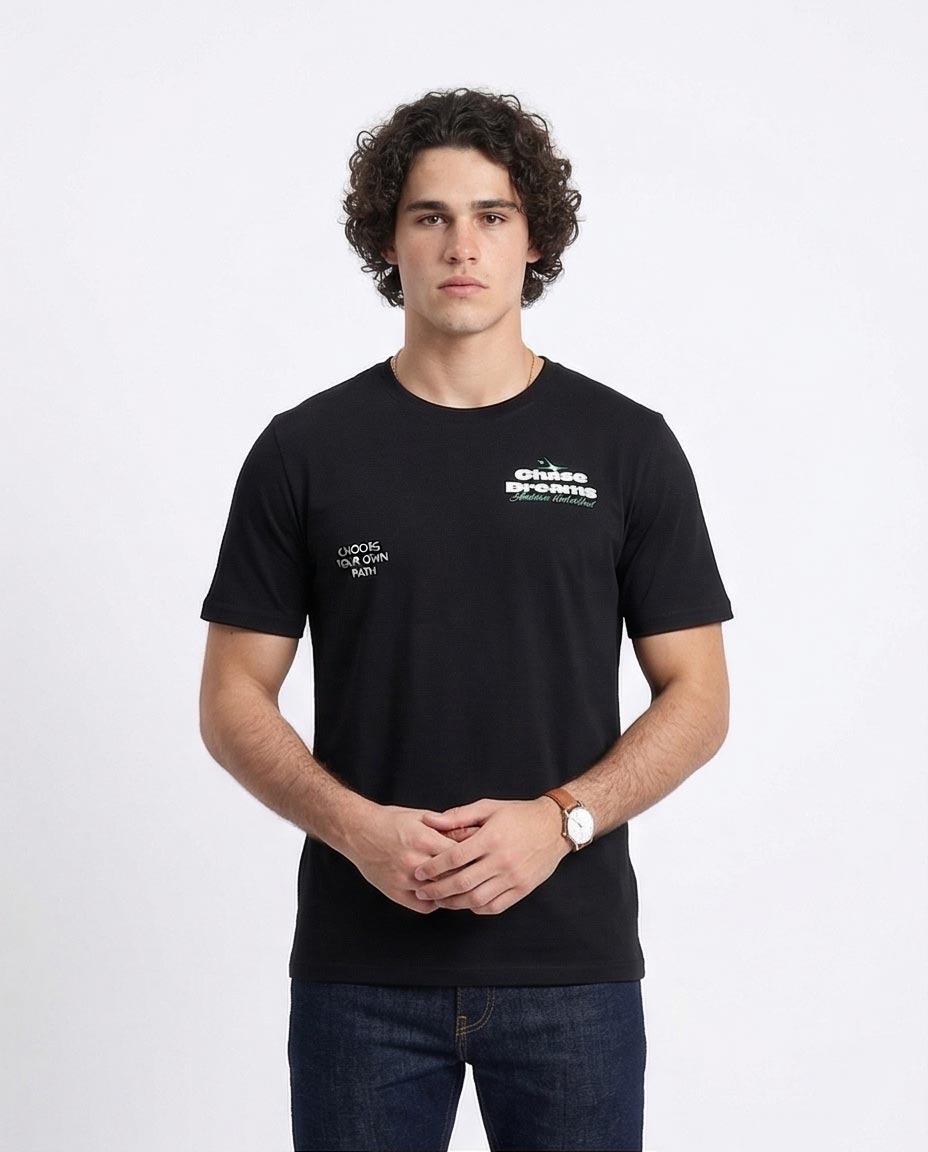 Man wearing a black t-shirt with text on a white background