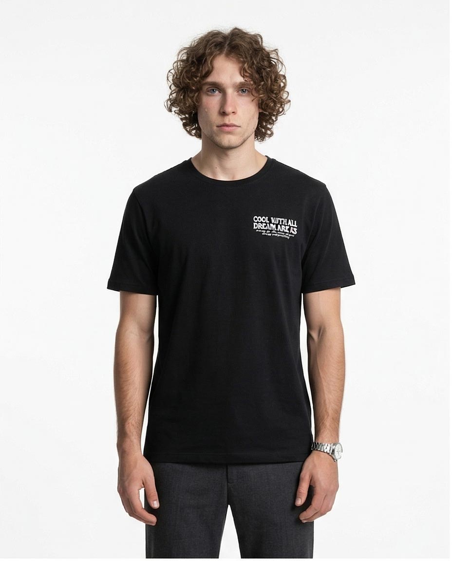 Man wearing a black t-shirt with text on a white background